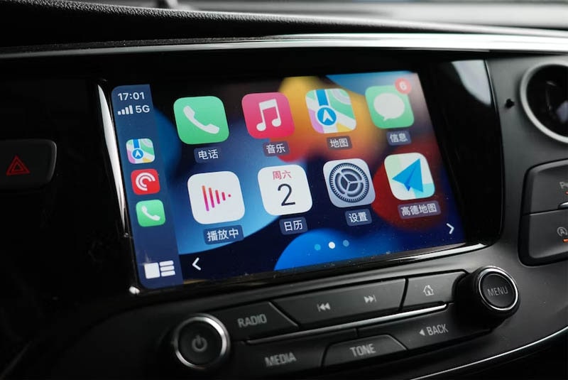 Using CarPlay on a car.