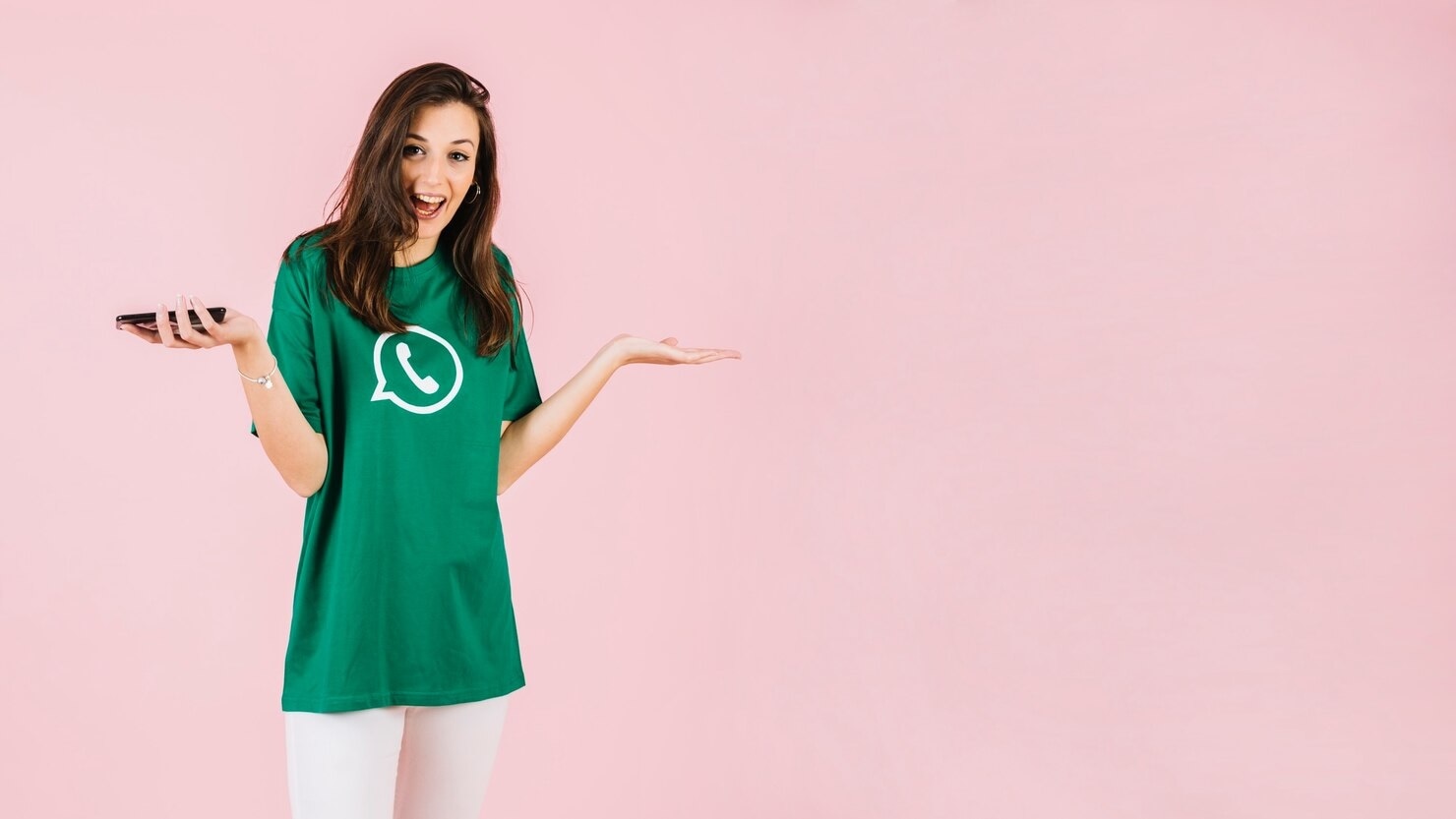 woman wearing whatsapp tshirt shrugging